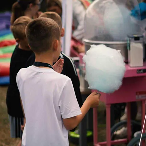 Kids eating candy floss